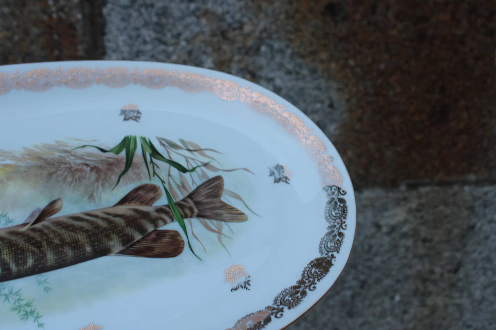 Large French porcelain dish L.C – Painted pike & gilded frieze
