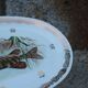 Large French porcelain dish L.C – Painted pike & gilded frieze