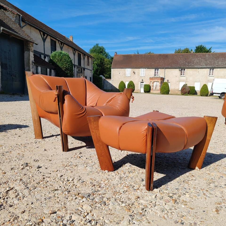 Percival lafer mp-211 sofa set with two armchairs and an ottoman in leather.