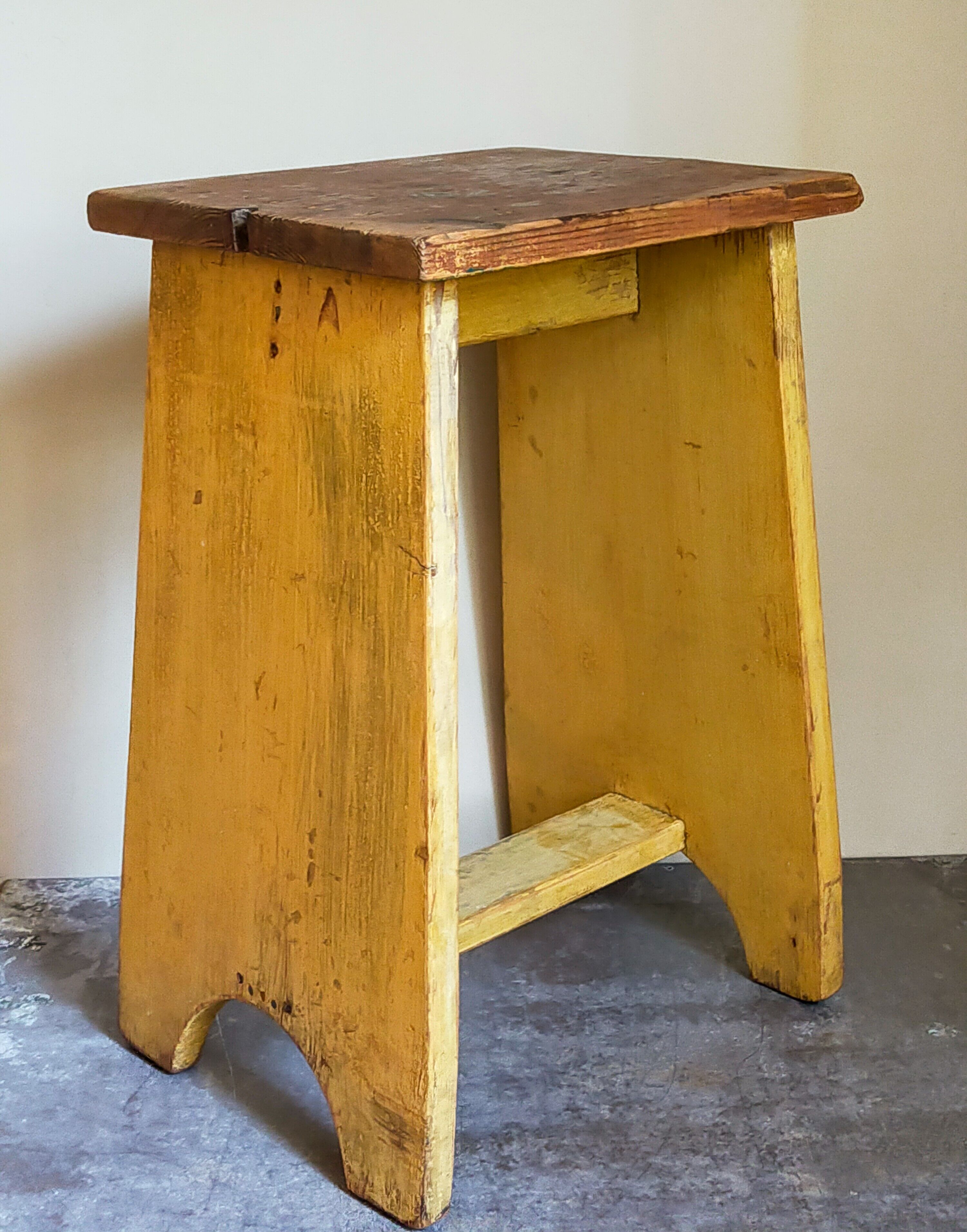 Art-populaire workshop stool in patinated painted wood