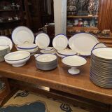 Limoges porcelain table service with blue band on white and gold background