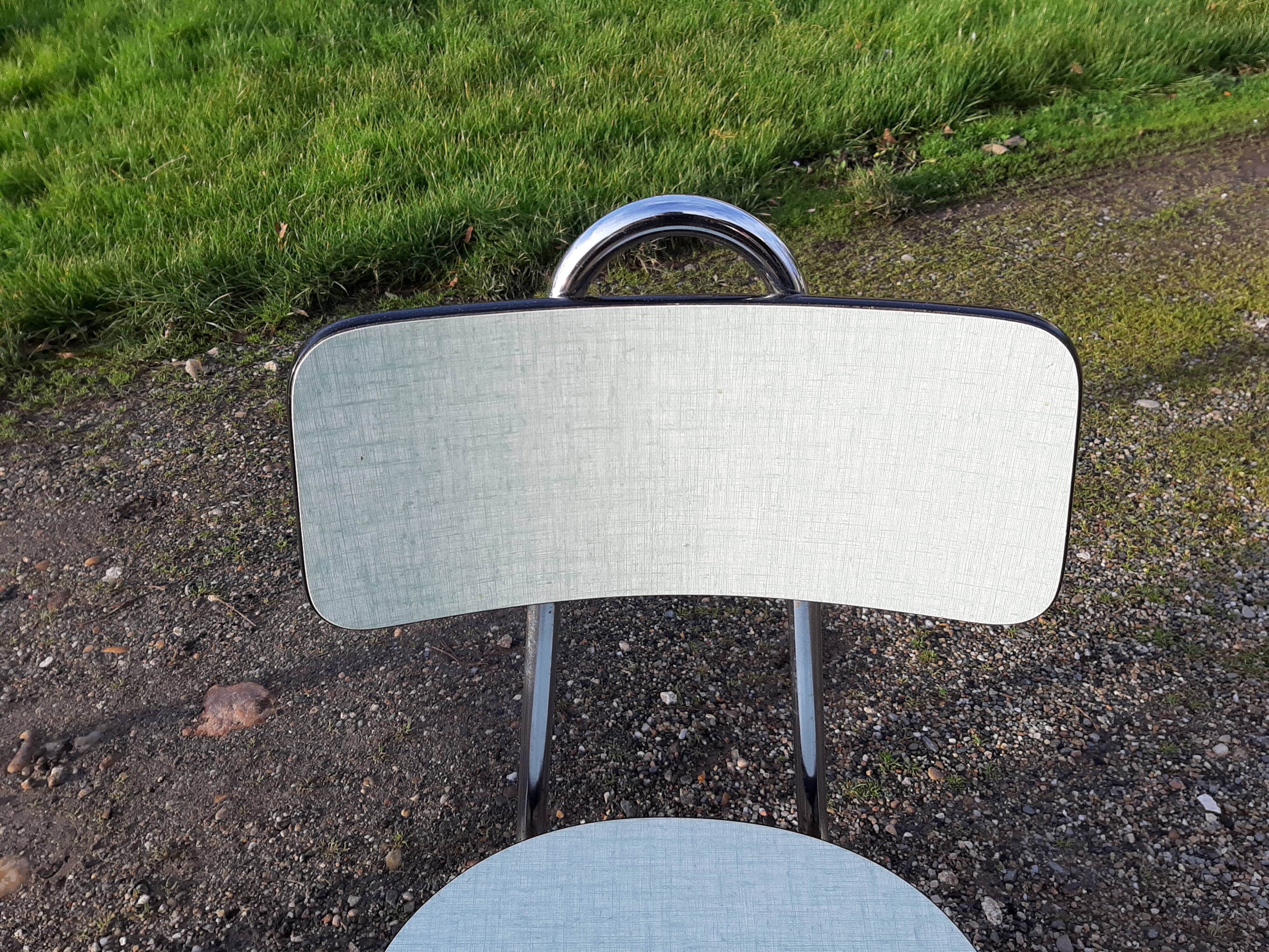 Table et 4 chaises formica vintage de marque Colmon