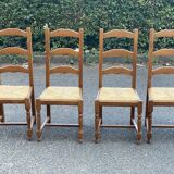4 straw and solid wood chairs with high backs
