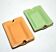 Pair of vintage ashtrays in glazed ceramic and golden orange and green