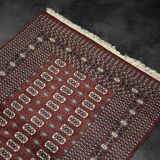 Handwoven red Boukhara oriental rug, 1960s