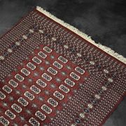 Handwoven red Boukhara oriental rug, 1960s