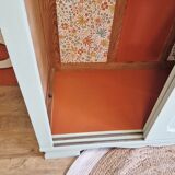 Wardrobe in old wood, renovated and restyled in celadon green