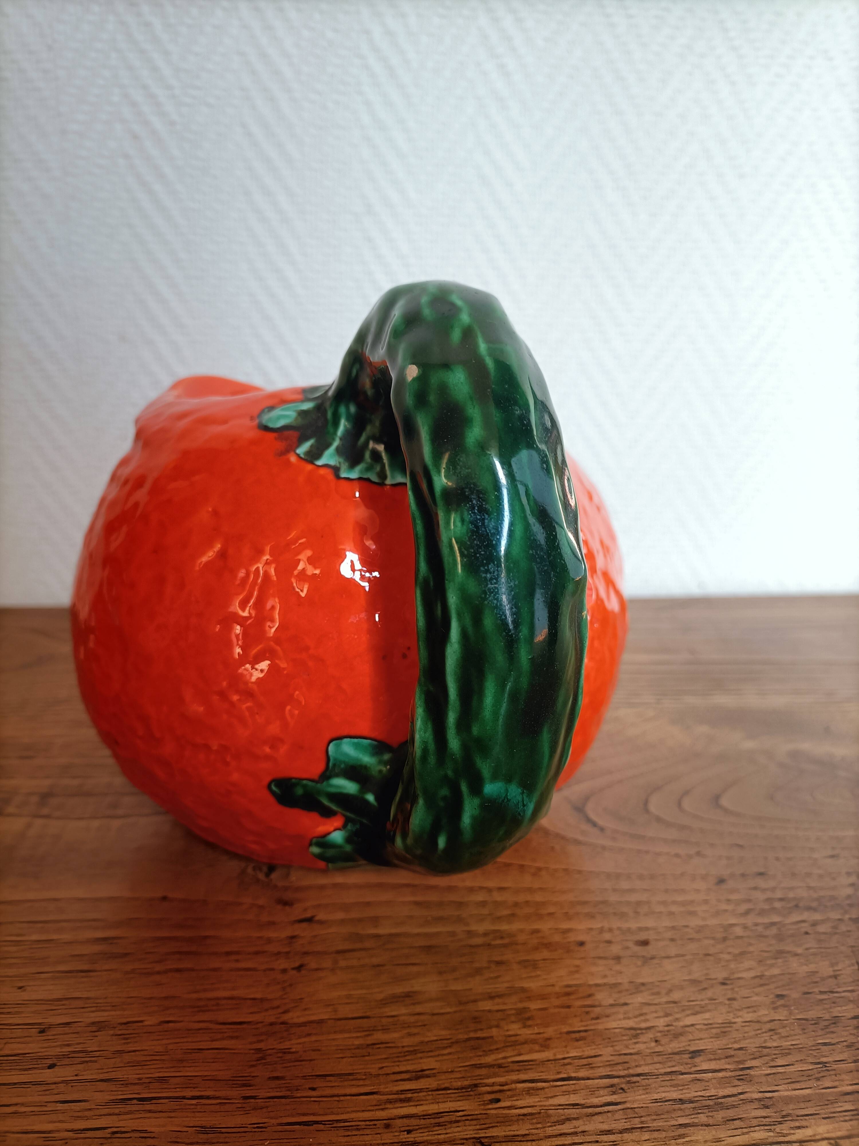 Orange pitcher in Corsican slip