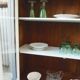 Display case, old shallow sideboard re-enchanted in cloud gray.