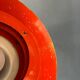 Mid-century Danish style orange brass suspension light.