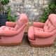 Pair of pink tufted velvet frog chairs from the 1970s.