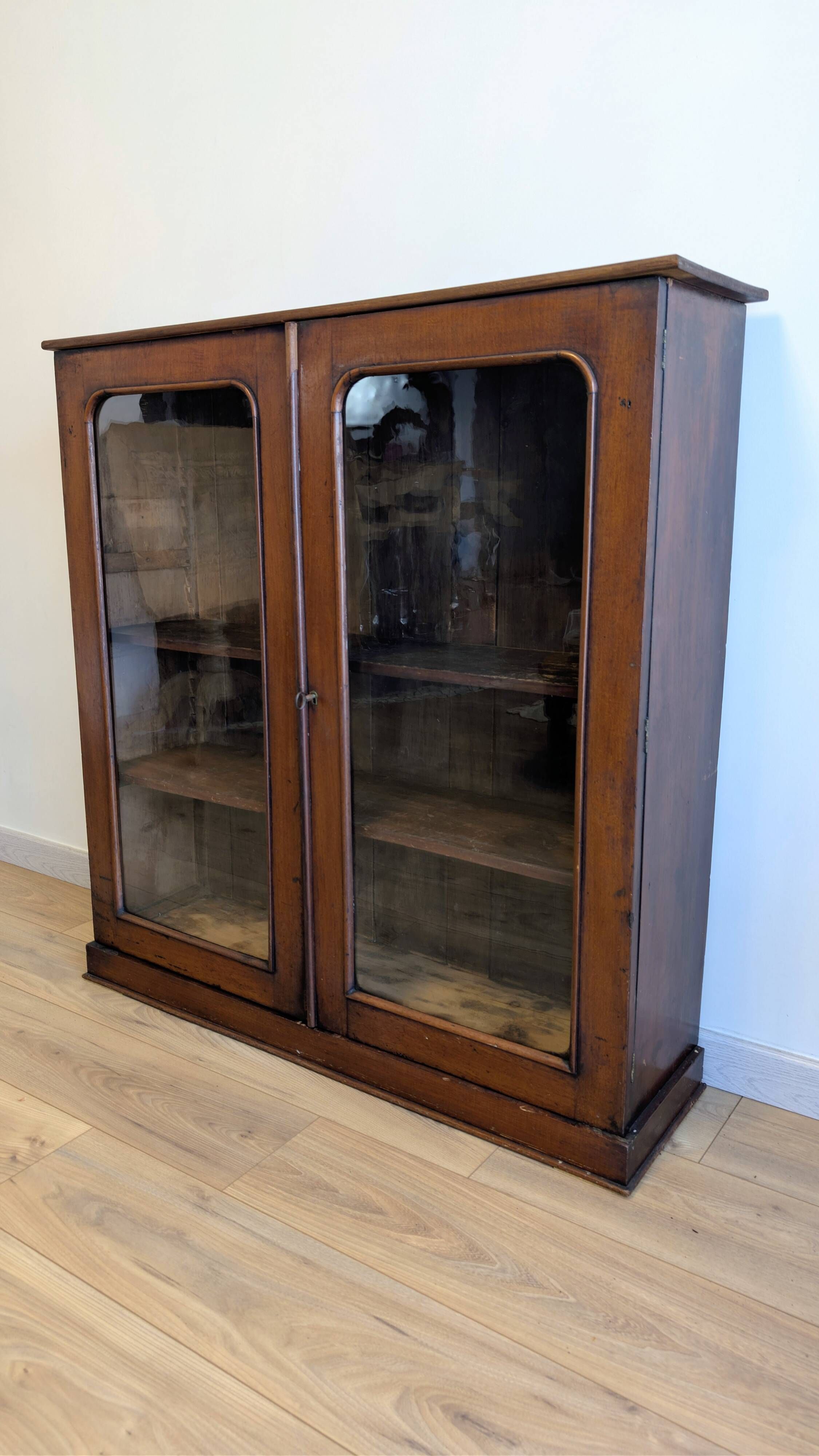 Victorian English mahogany display cabinet, elegant showcase furniture.