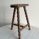 Tripod stool with turned wooden legs