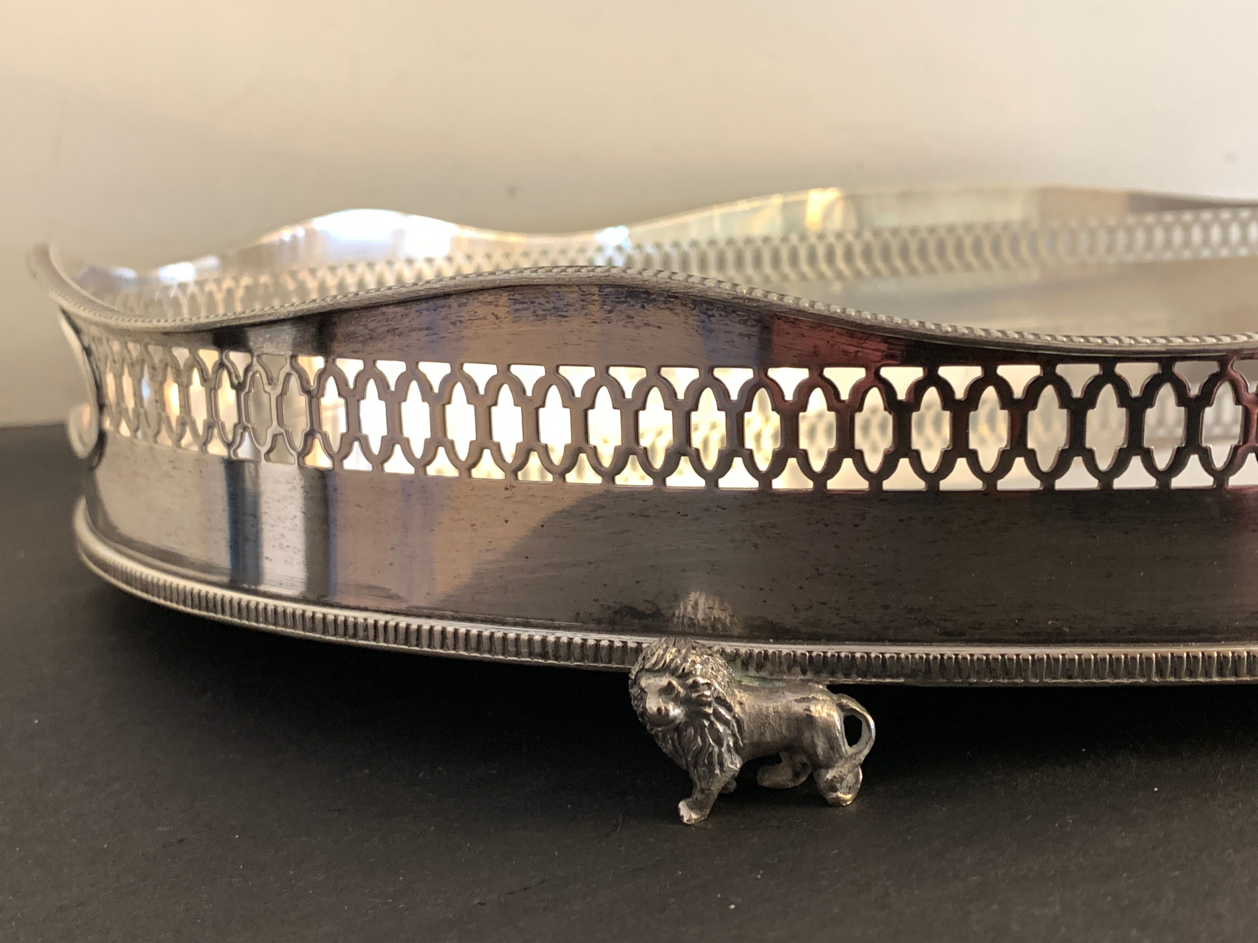 Alpaca silver metal to  lion feet and openwork borders