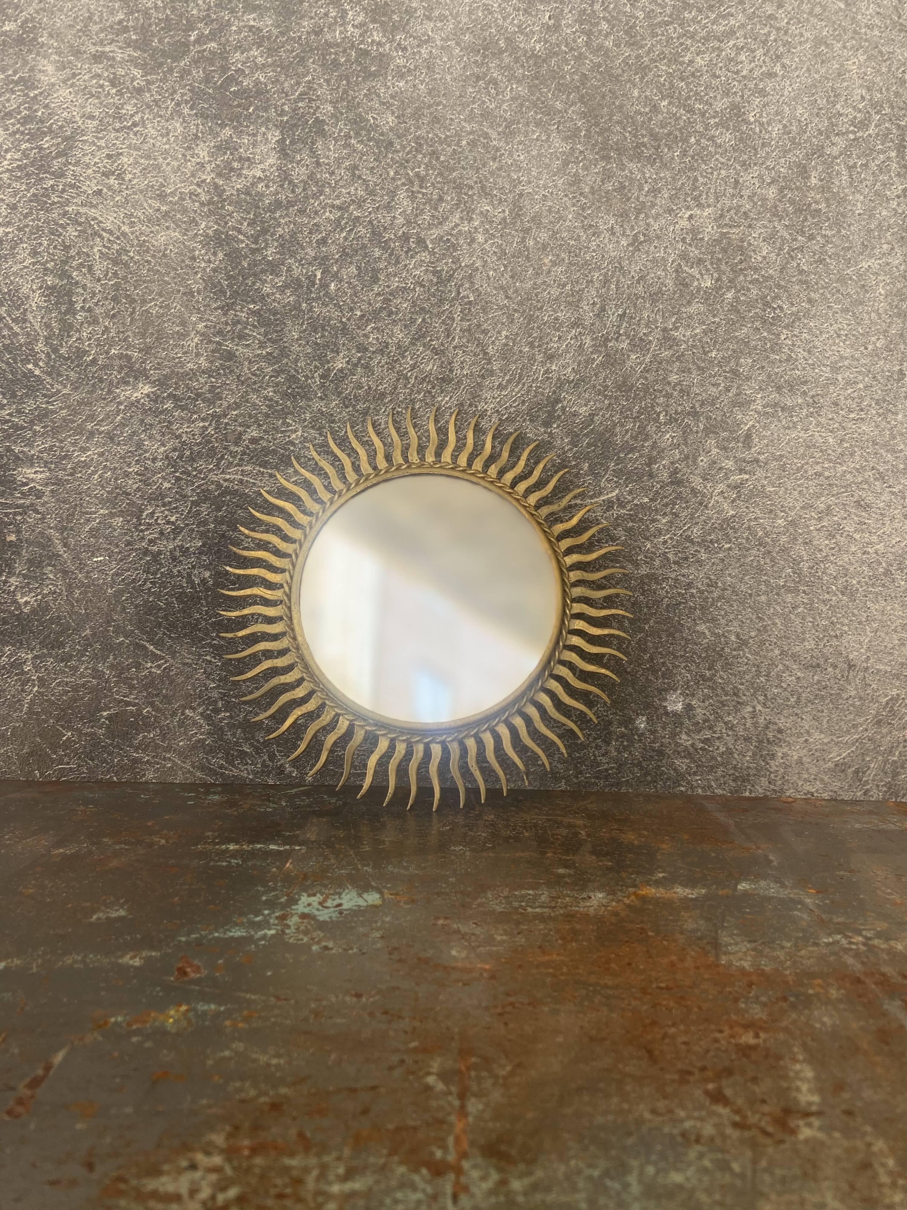 Vintage gold metal sun mirror