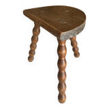 Low tripod stool with turned legs