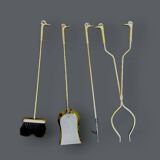 Antique fireplace tool in gilded zamak with duck head designs.