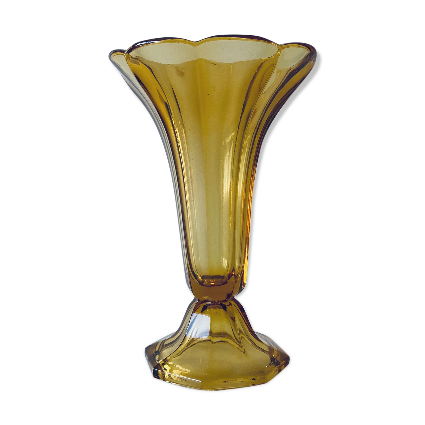 Ancient tulip vase in amber glass