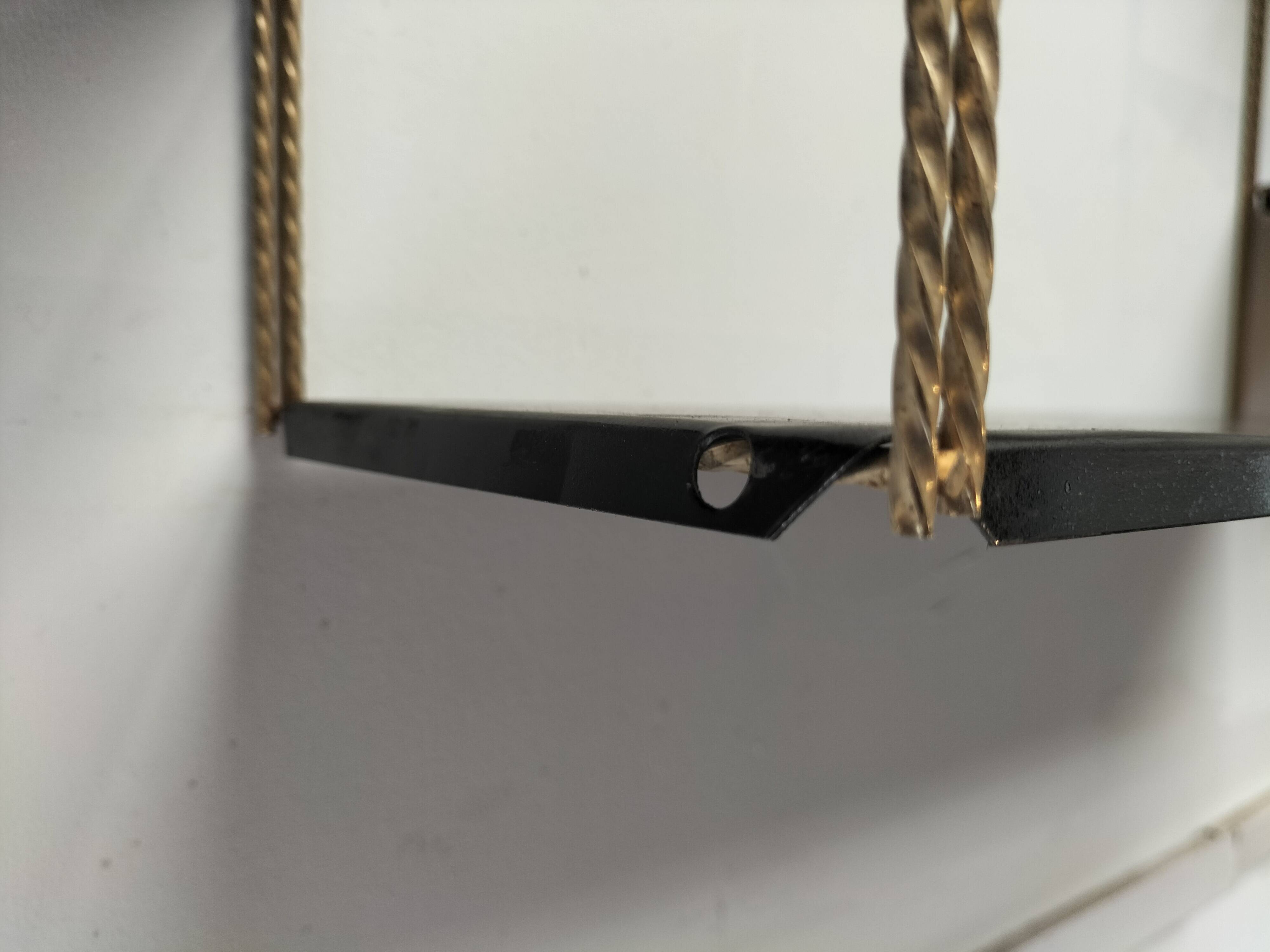 Modular black metal shelf