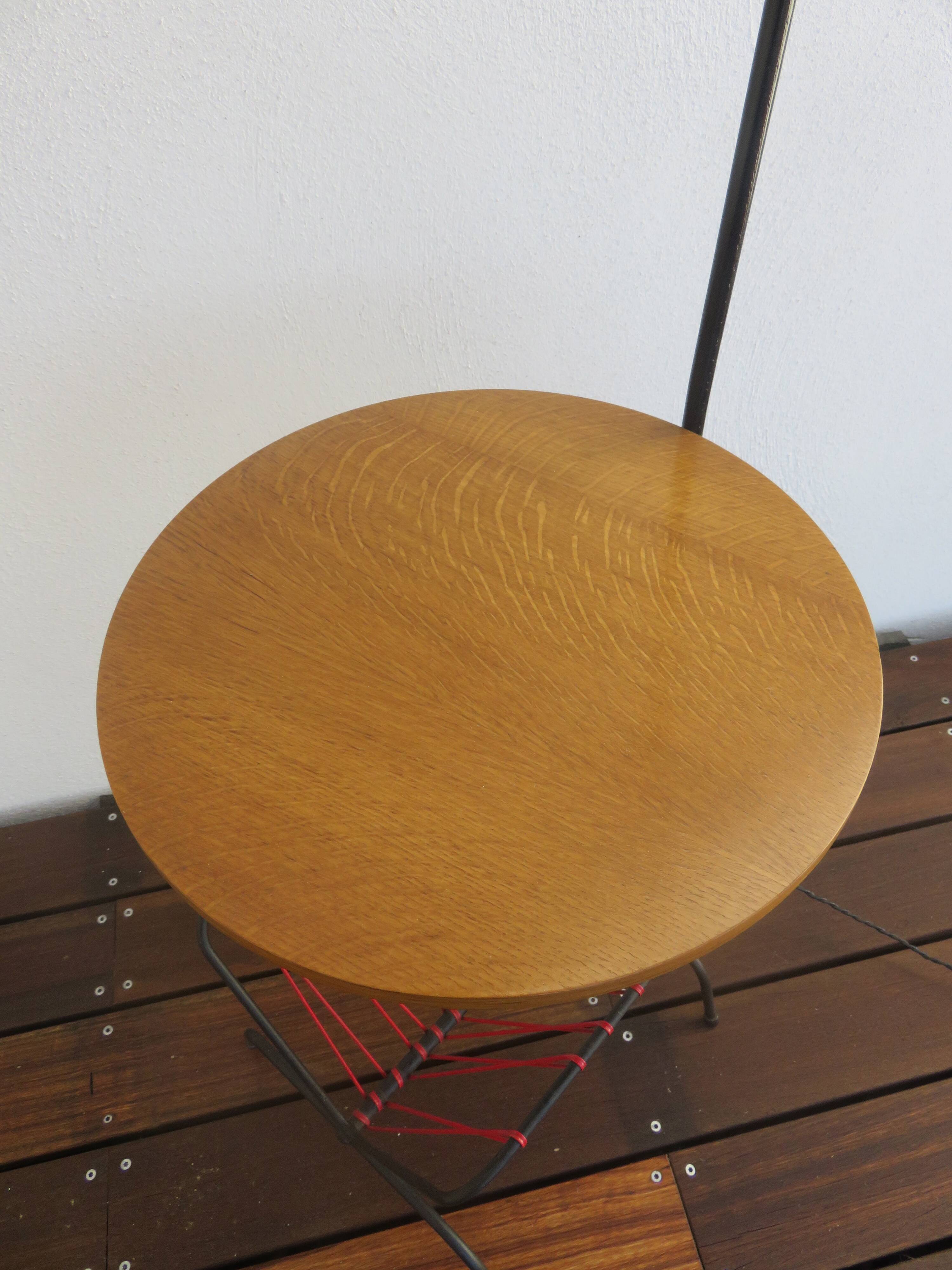 Streetlight pedestal table is typical magazine of the year 1950