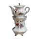 Old earthenware herbal tea maker