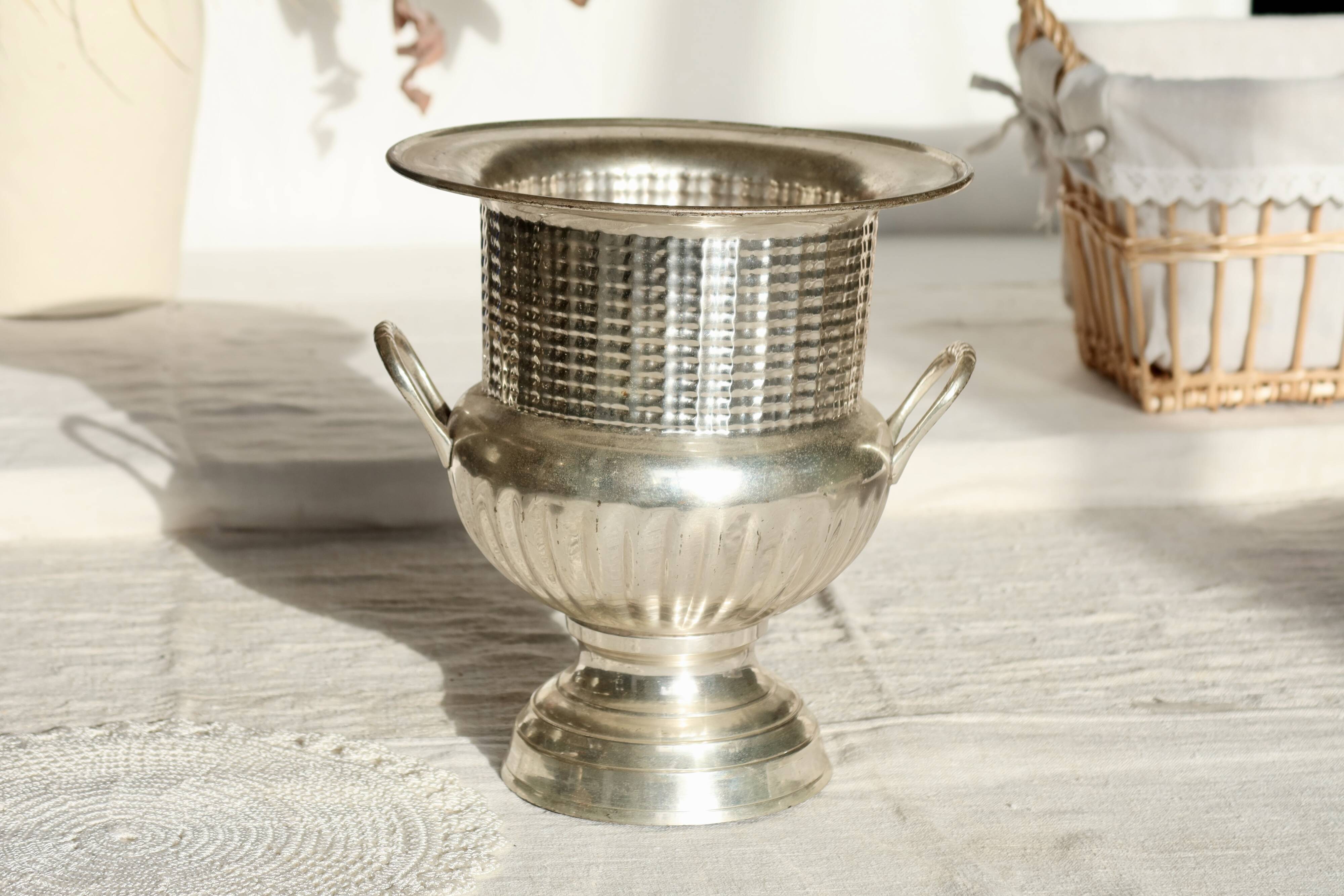 Antique silver-plated metal champagne bucket with handles