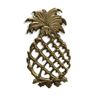 Pineapple in brass under dish
