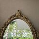 Oval mirror in Baroque style