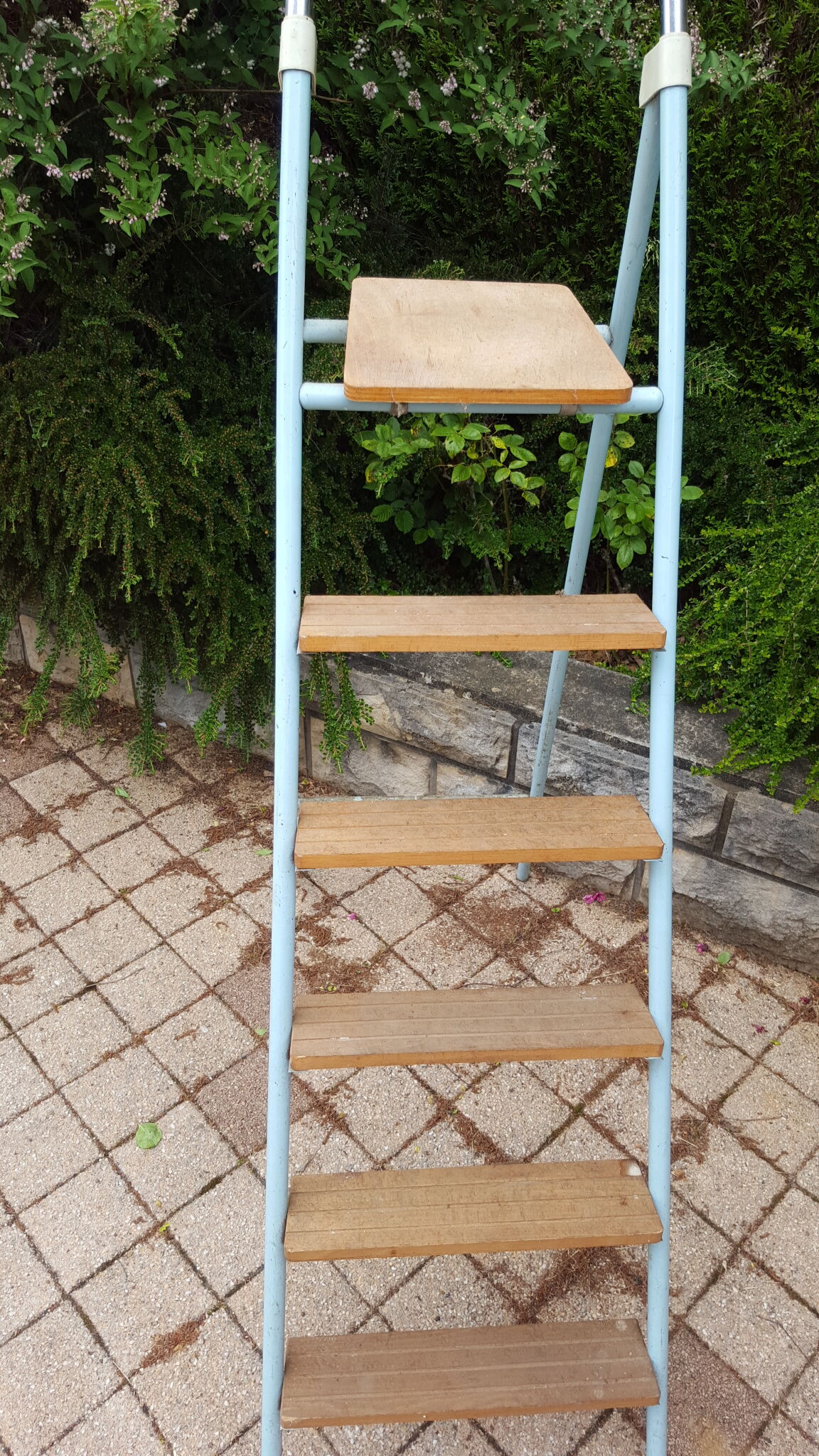 Vintage stepladder blue wooden steps