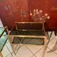 Paire de tables chrome doré et verre fumé