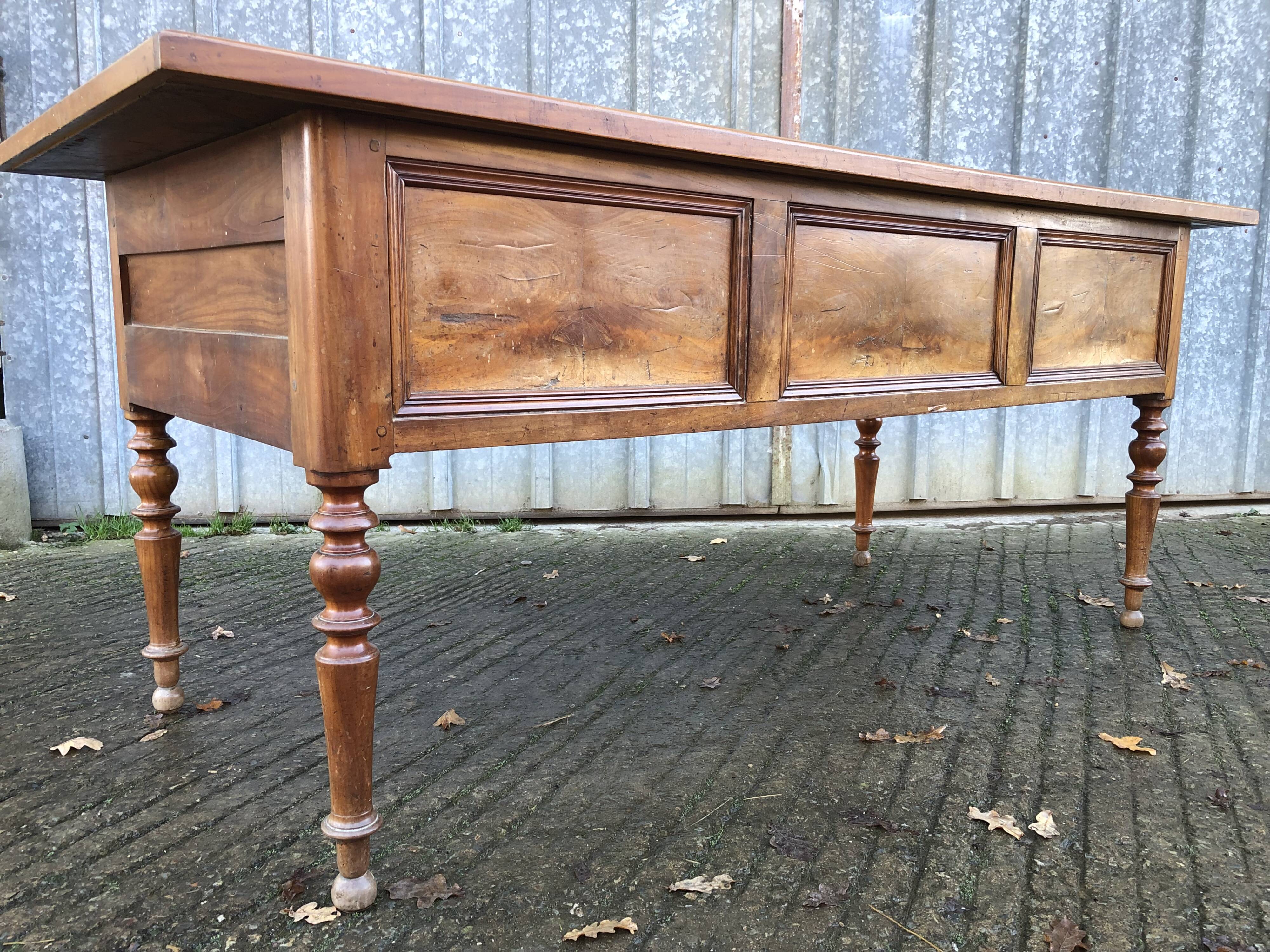 Solid cherry game table with 2 front drawers and panelled crosspieces.