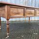 Solid cherry game table with 2 front drawers and panelled crosspieces.