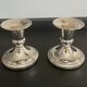 Pair of vintage candle holders in silver metal