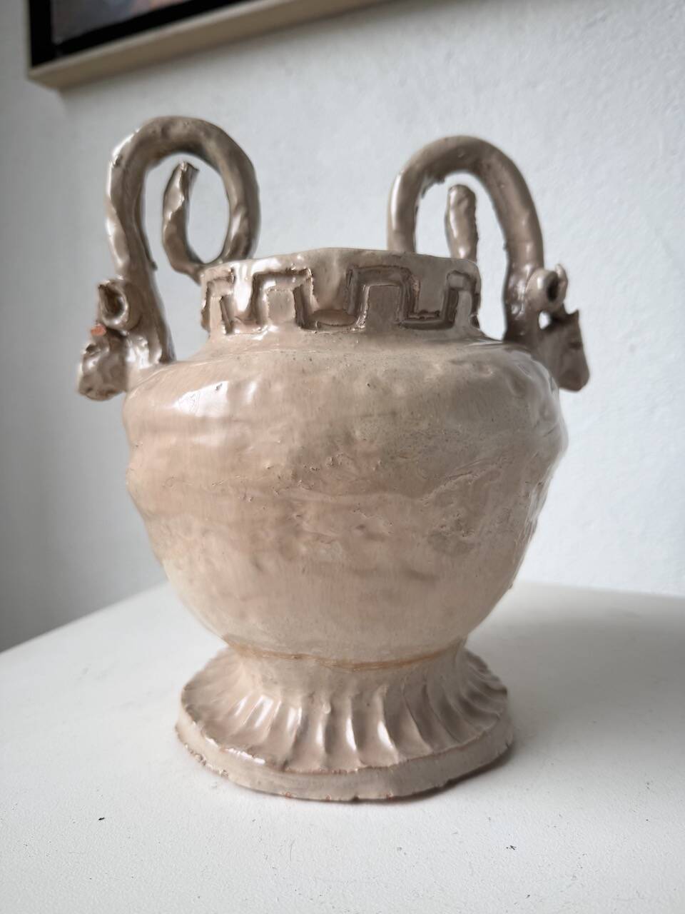 Ceramic bowl with ram heads