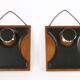 Two coat hangers, wood, leather and black leather, 70s