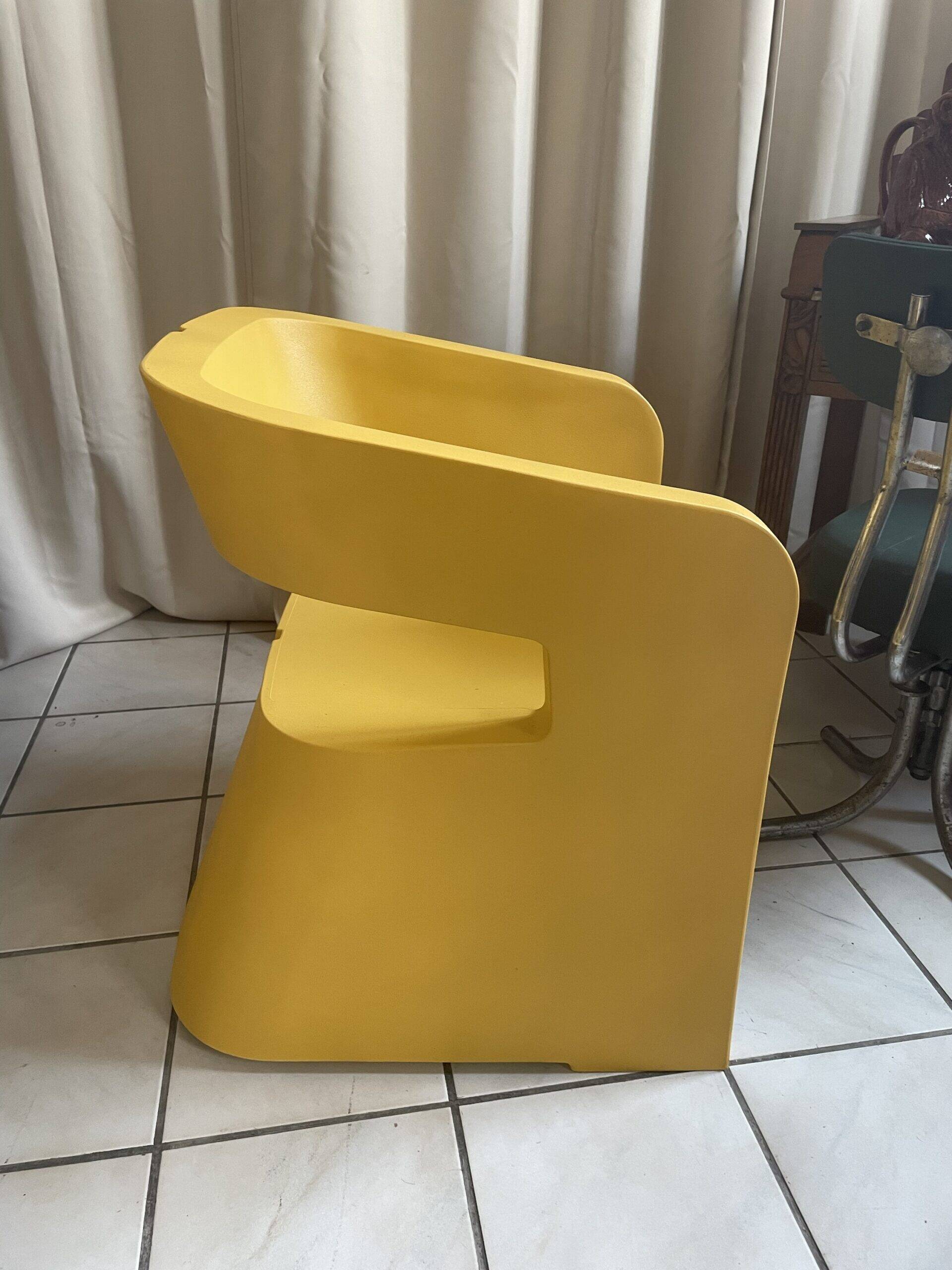 Orange-yellow designer armchair