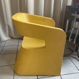 Orange-yellow designer armchair