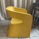 Orange-yellow designer armchair