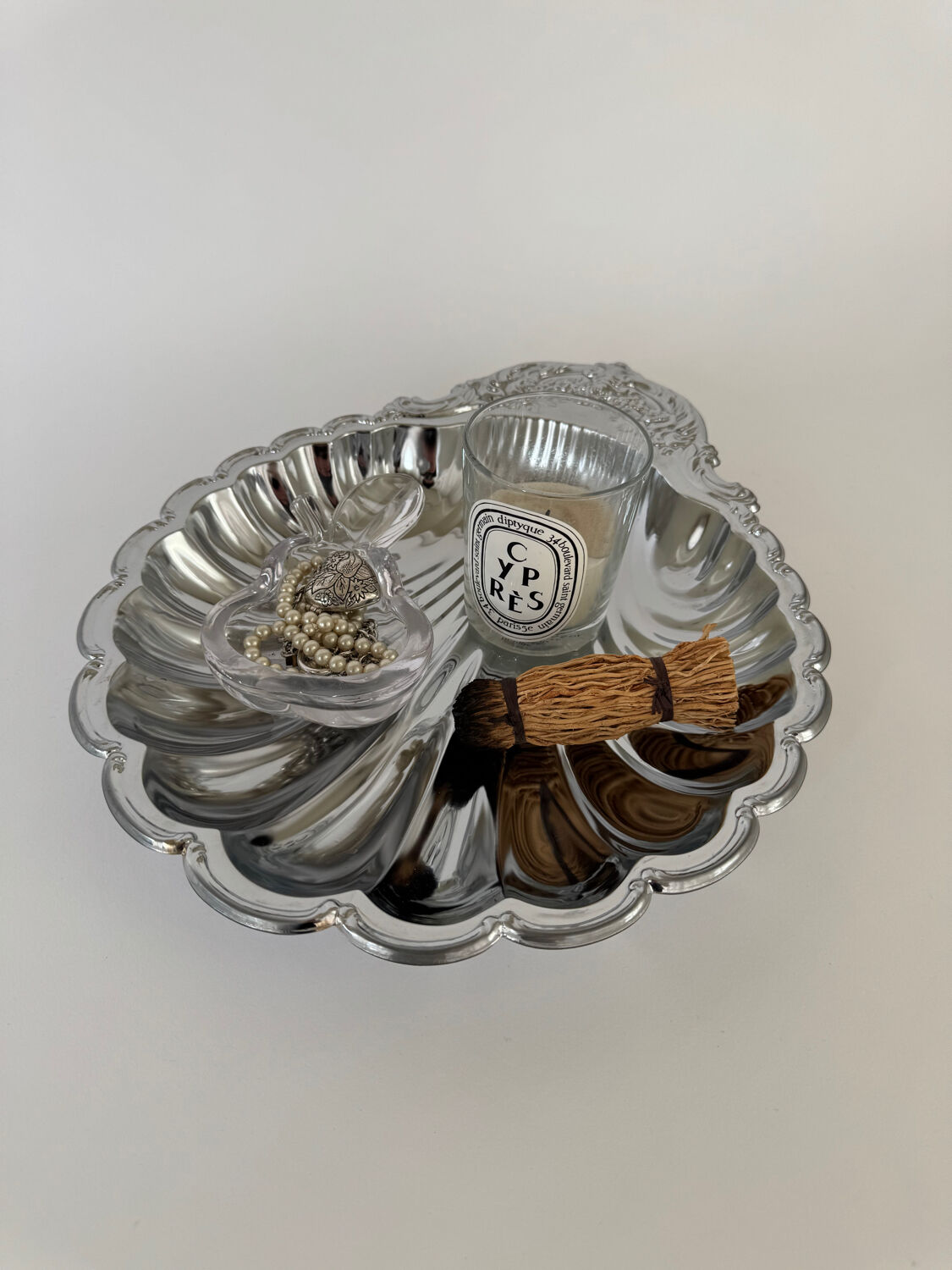Large silver-plated serving dish in the shape of a vintage shell.