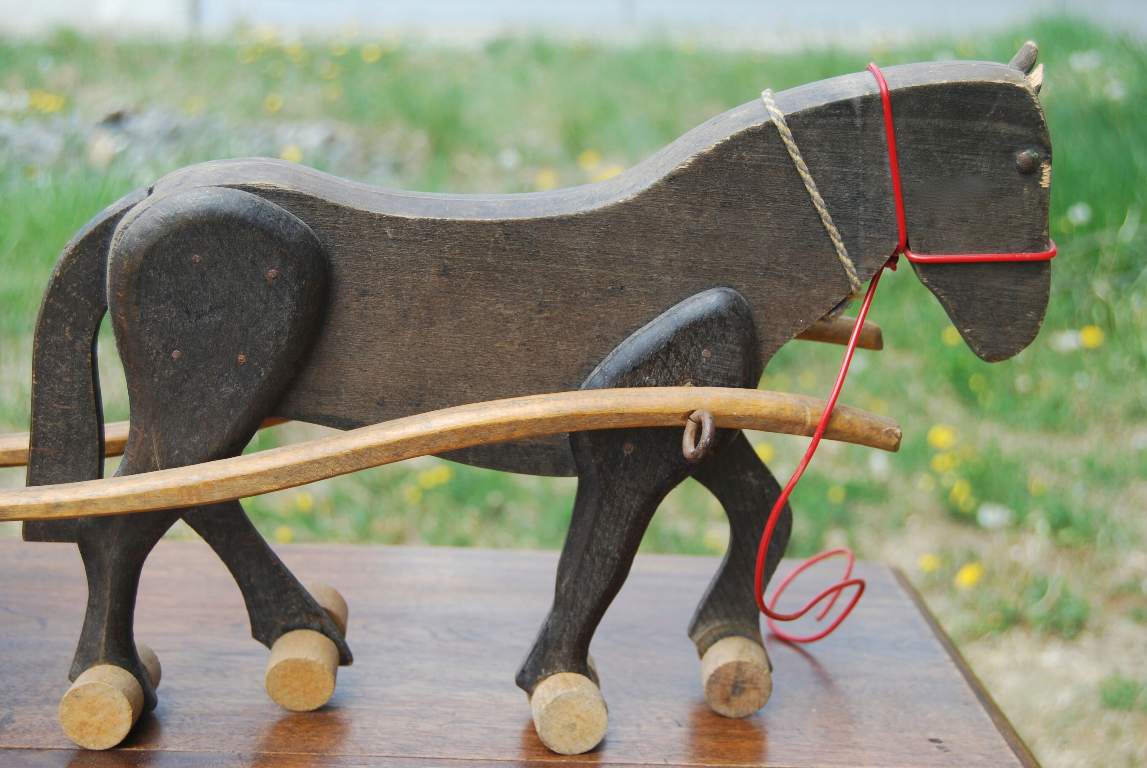 Old wooden toy Dejou. Hitch, horse and cart.