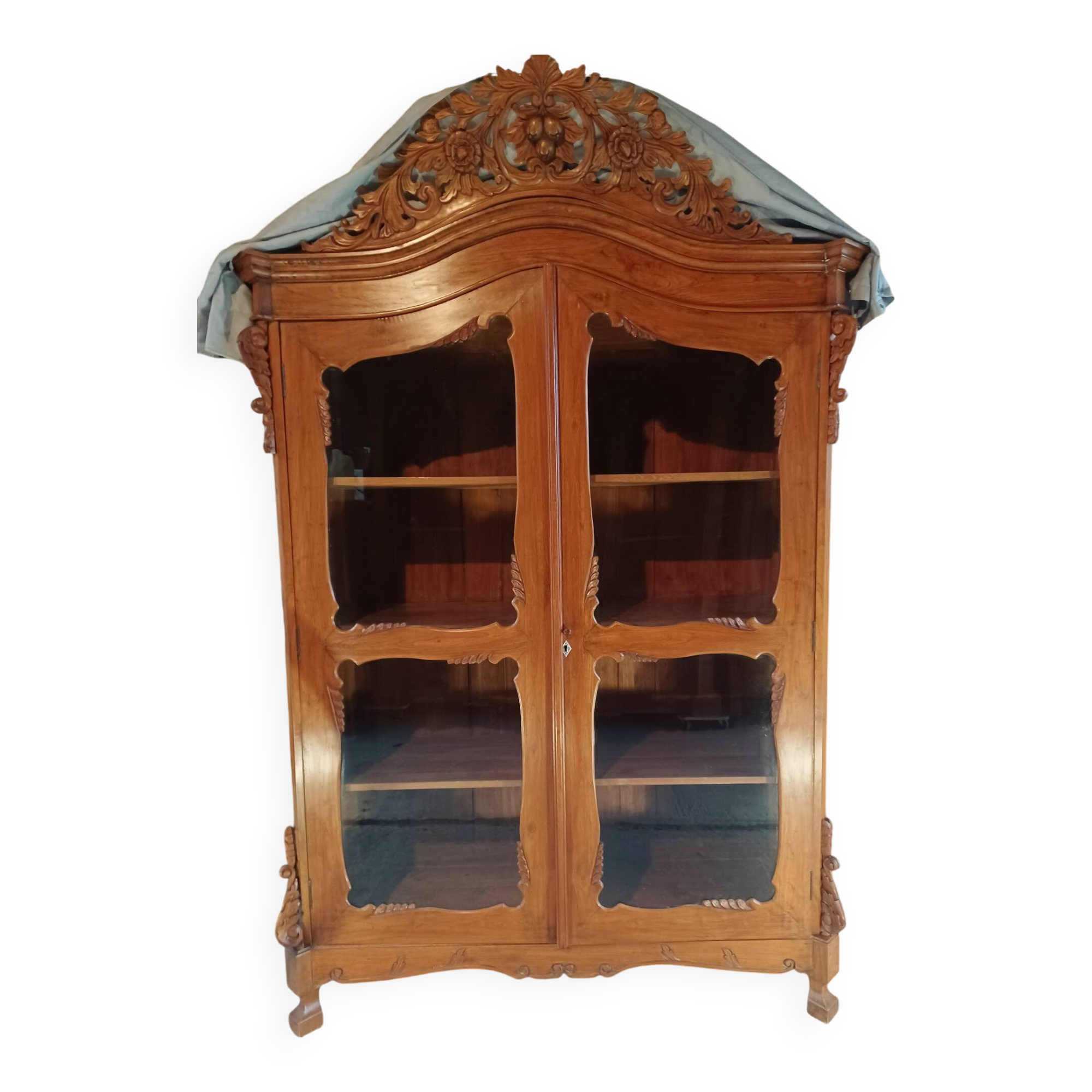 Large glass and carved cabinet