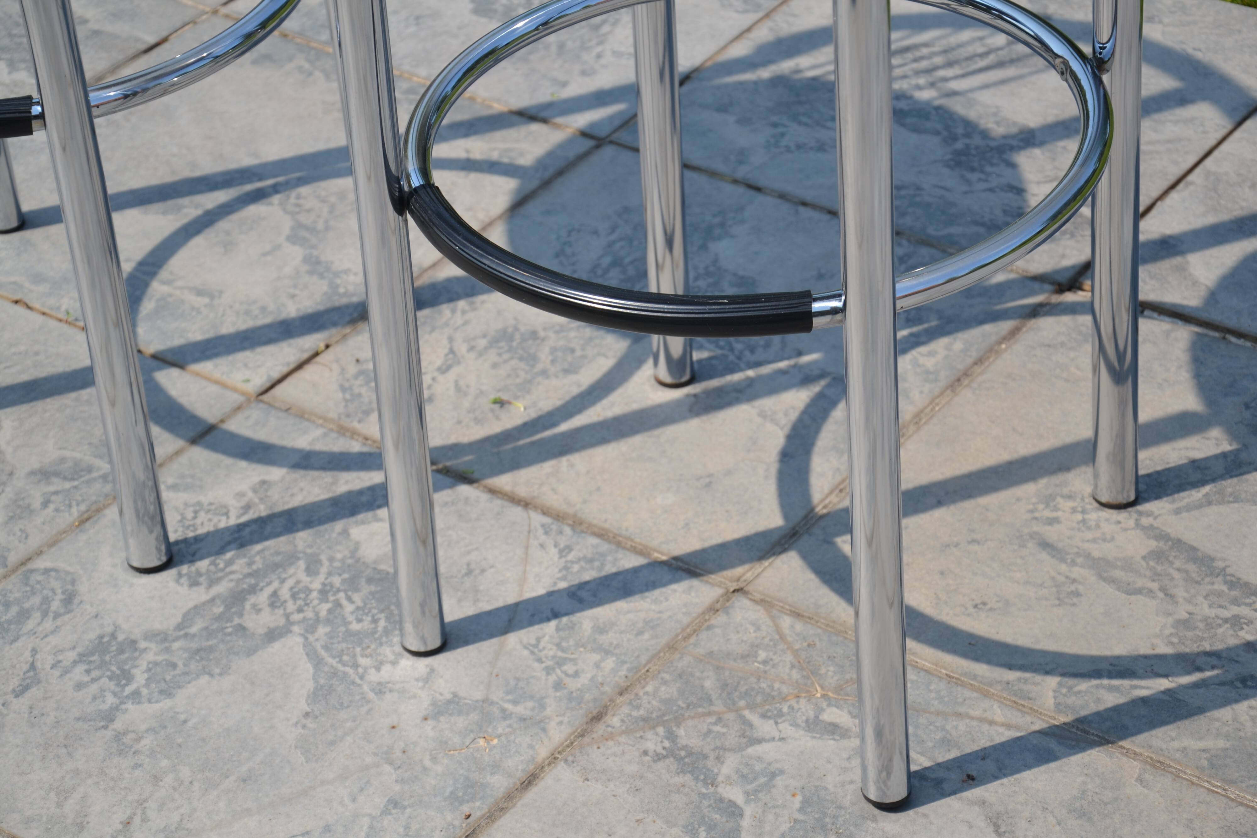 2 "Calligaris" bar stools with chrome metal and refurbished seats.