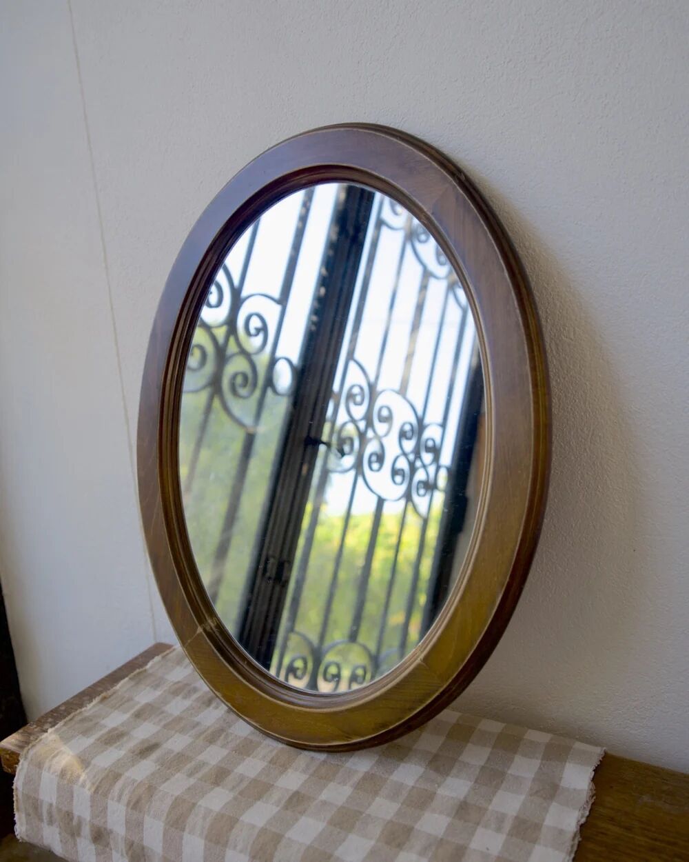 Oval wooden mirror