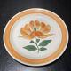 Set of twelve ceramic flat plates by Gien, Mougins decor
