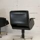 Pair of swivel armchairs, imitation leather and steel, Italy, circa 1960.