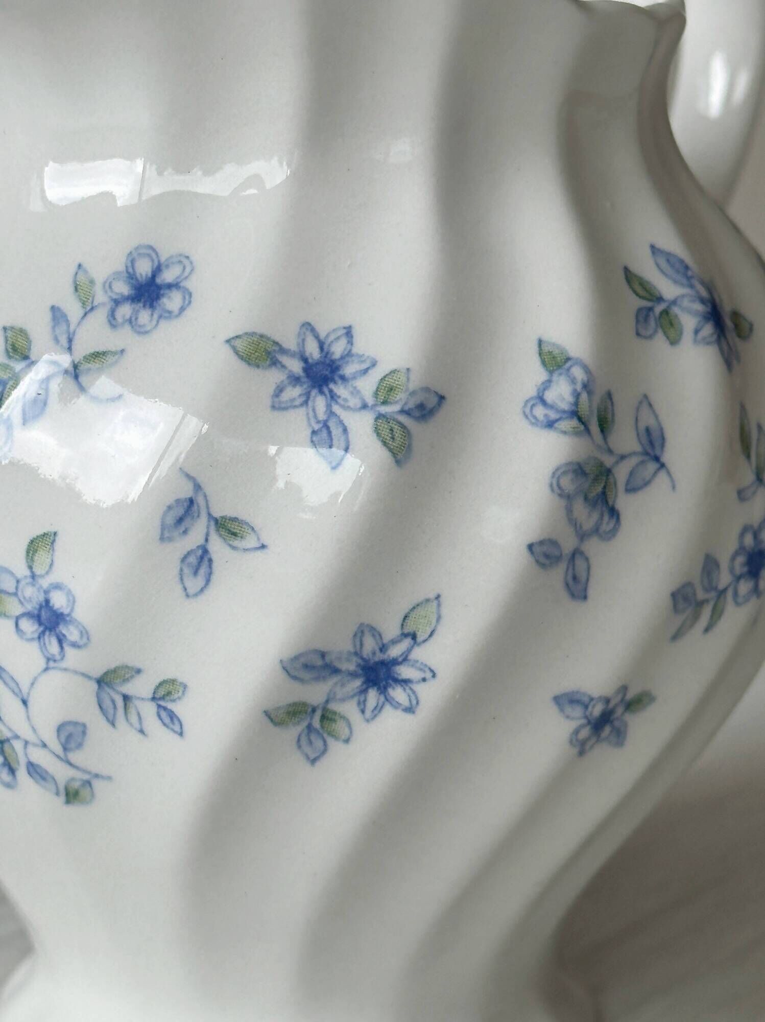White porcelain creamer with small blue flowers – Milk jug