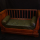 Banquette en noyer et cuir vert du XIXe siècle