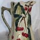Ancient pitcher in earthenware decoration cherry Saint Amand waters
