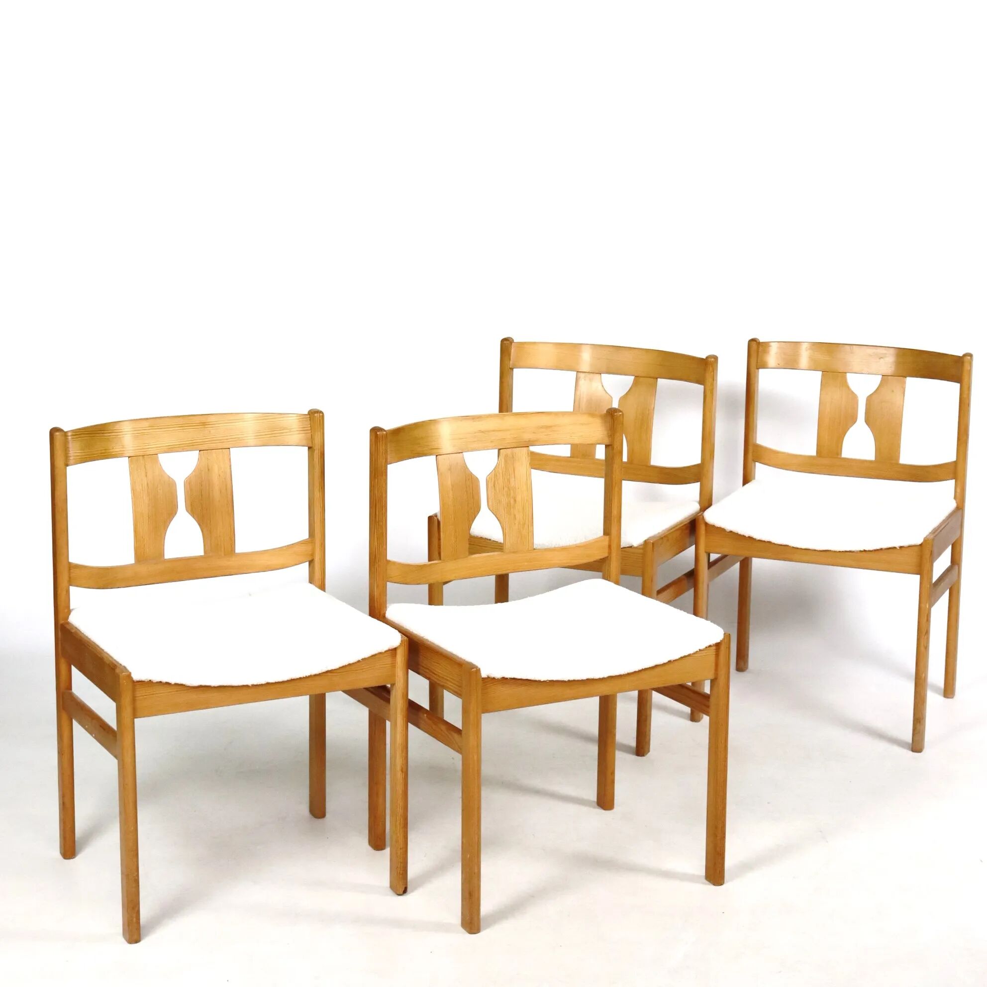 Set of four pine chairs from the 1960s.