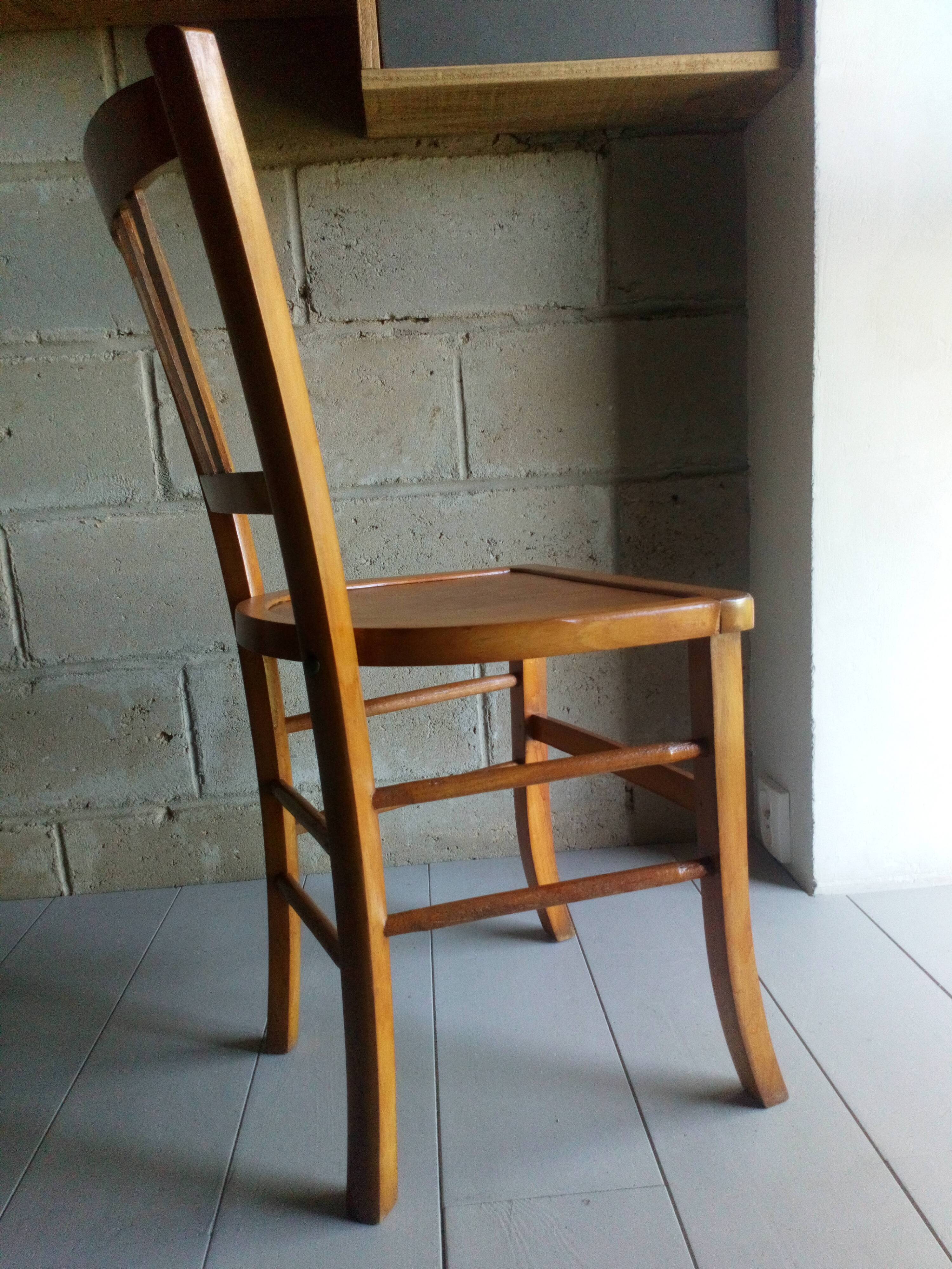 Blond wooden bistot chair from the 50s.